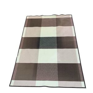 Ruggable Rug size 5x3 mauve and brown tones